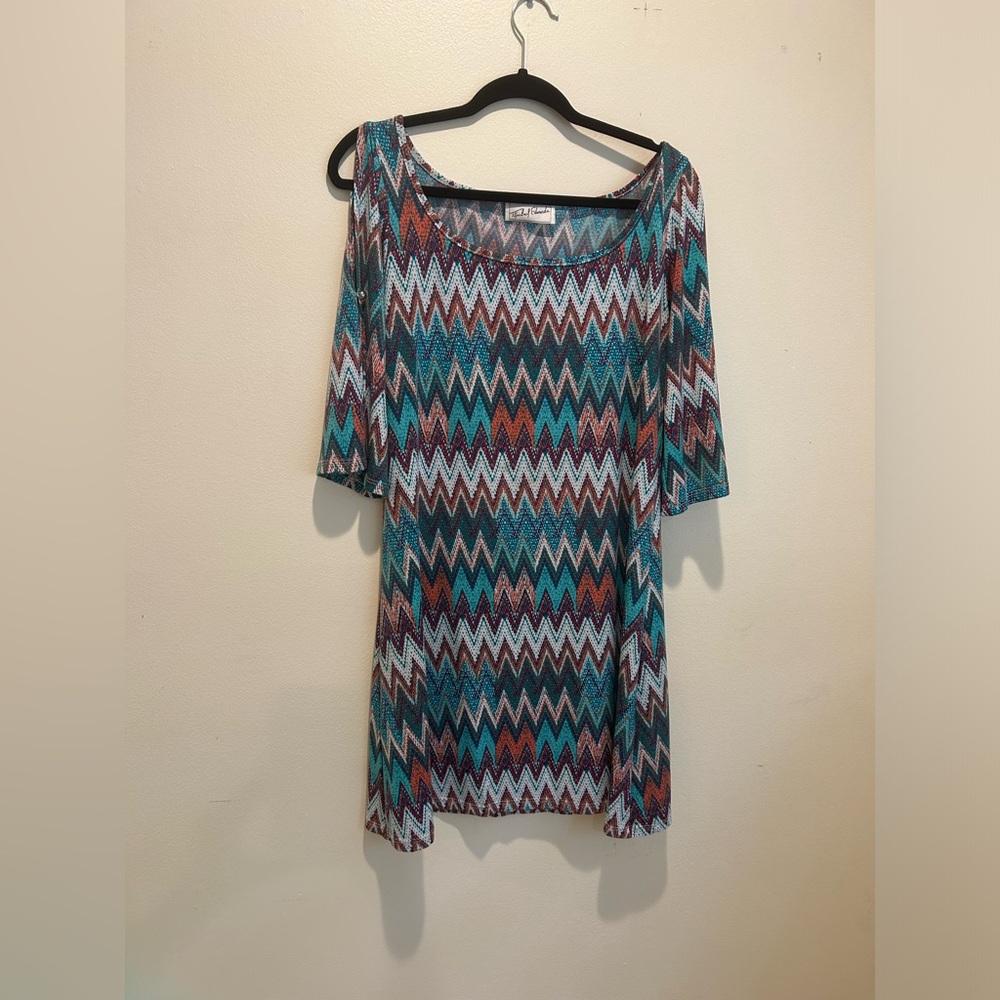 Size medium multi color casual dress with cut out 1/2 sleeves.